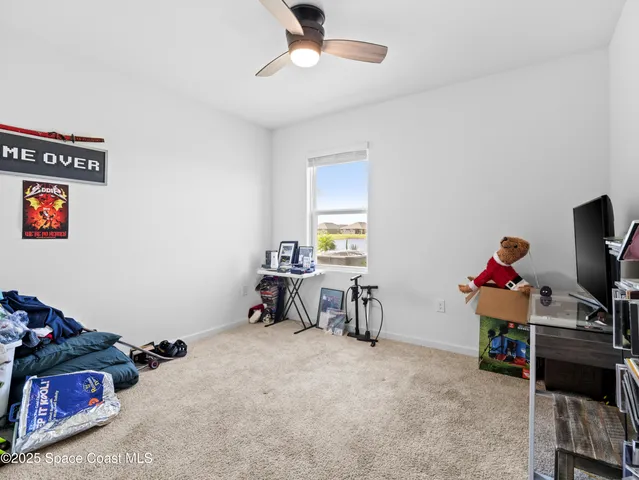 a view of a workspace with furniture