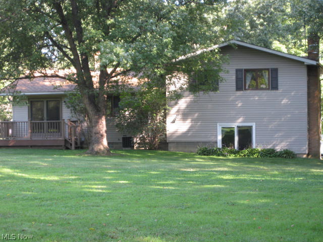 3288 Oser Road Norton, OH 44203 - Photo 2 of 25 Easy access to the rear yard! French doors off the dining area lead to the back deck. Sliding doors from the family room lead to a cement patio.