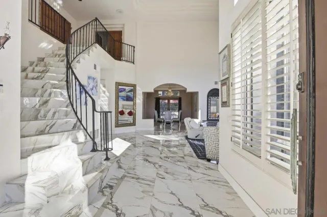 a view of living room and hallway with seating space