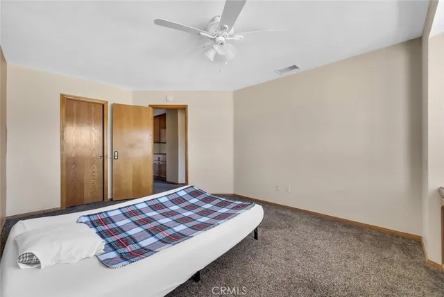 a view of cabinets with wooden floor