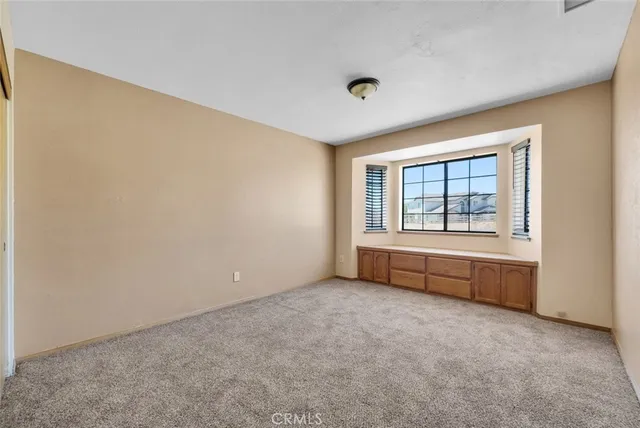 a bathroom with a double vanity sink toilet and shower