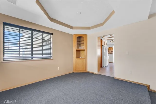 a view of empty room with windows