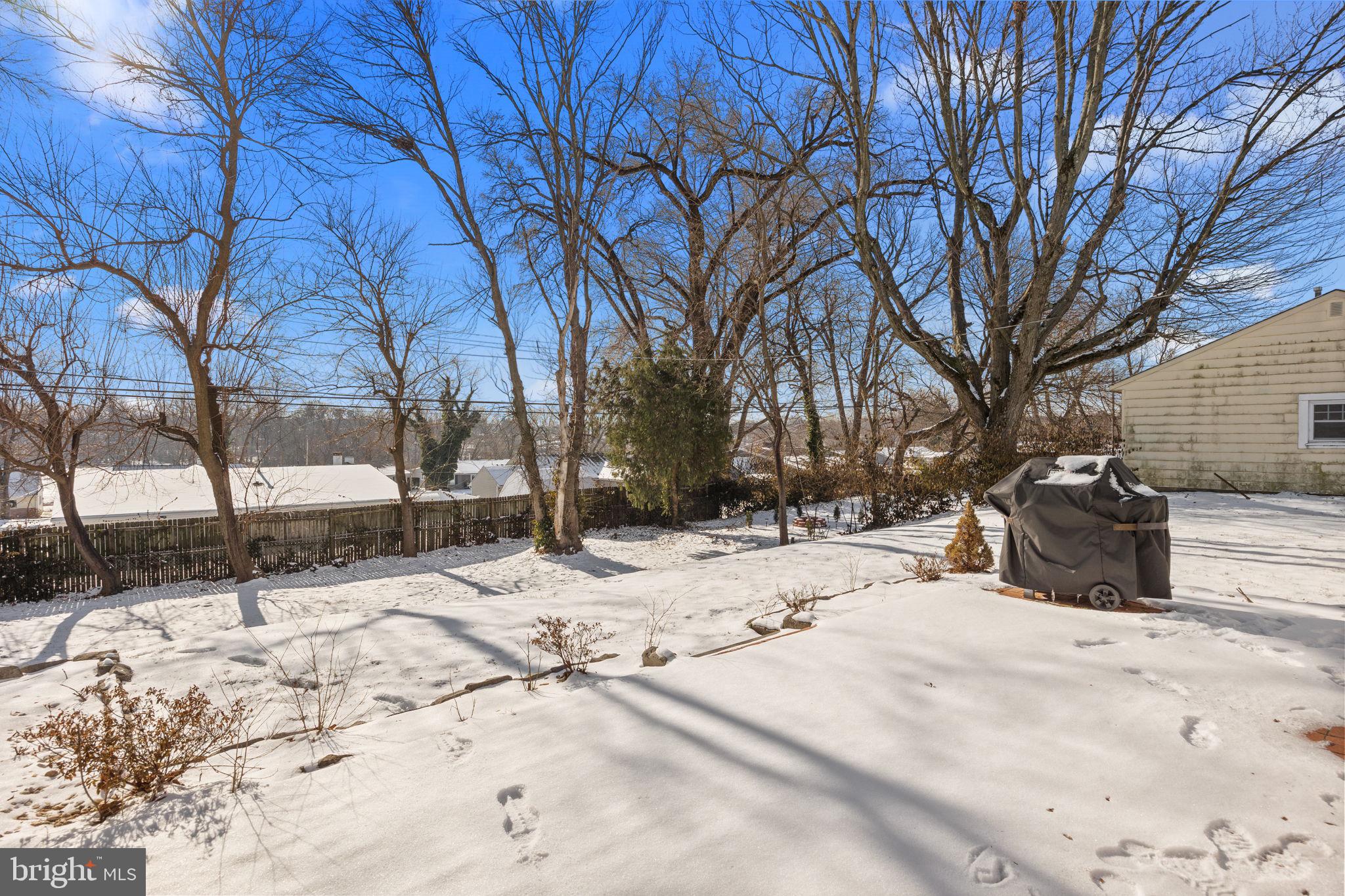 228 Devon Road Fairless Hills, PA 19030 - Photo 28 of 32 Oversized brick patio (under the snow)