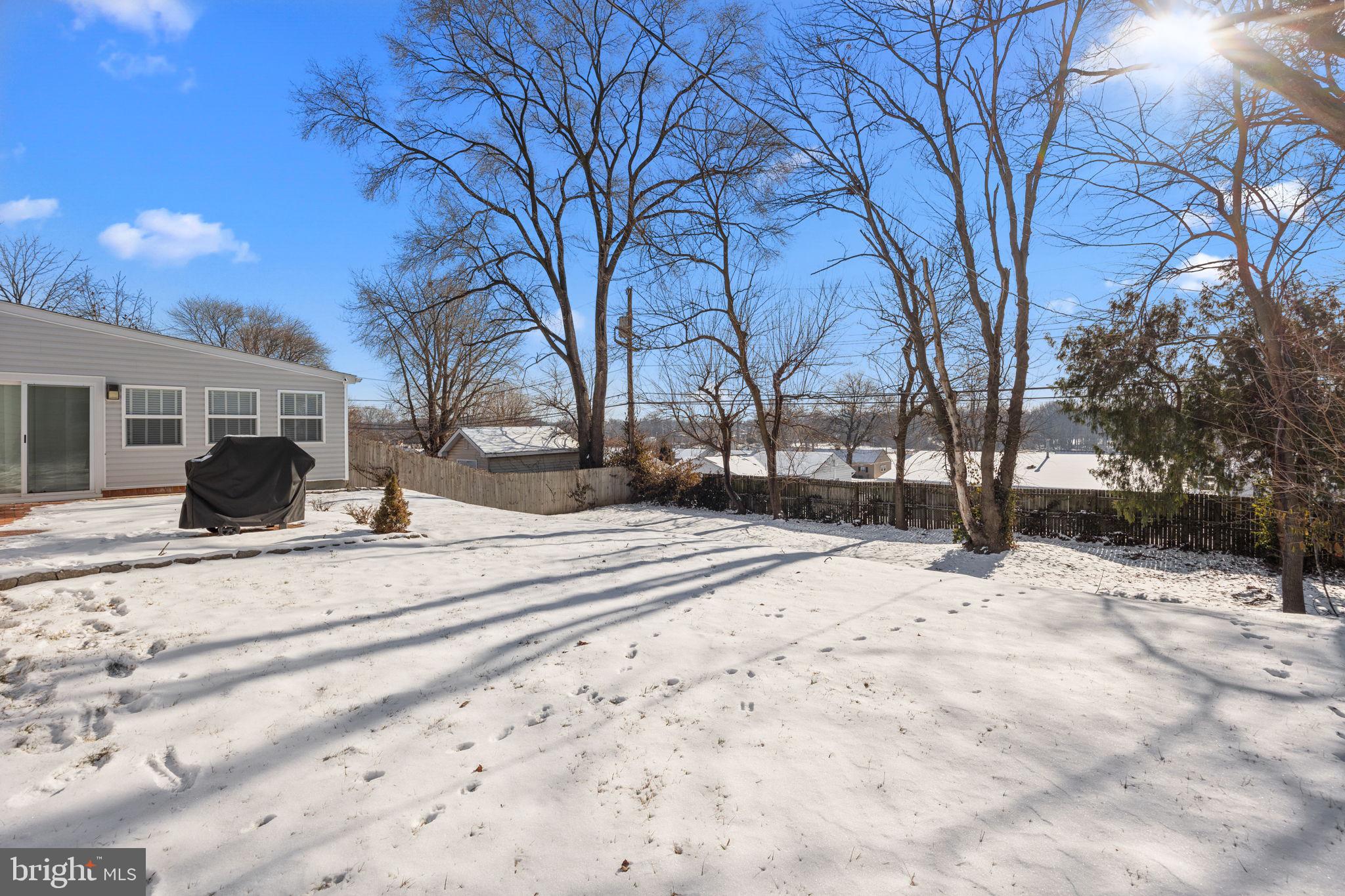 228 Devon Road Fairless Hills, PA 19030 - Photo 29 of 32 Rear of lot lined in trees