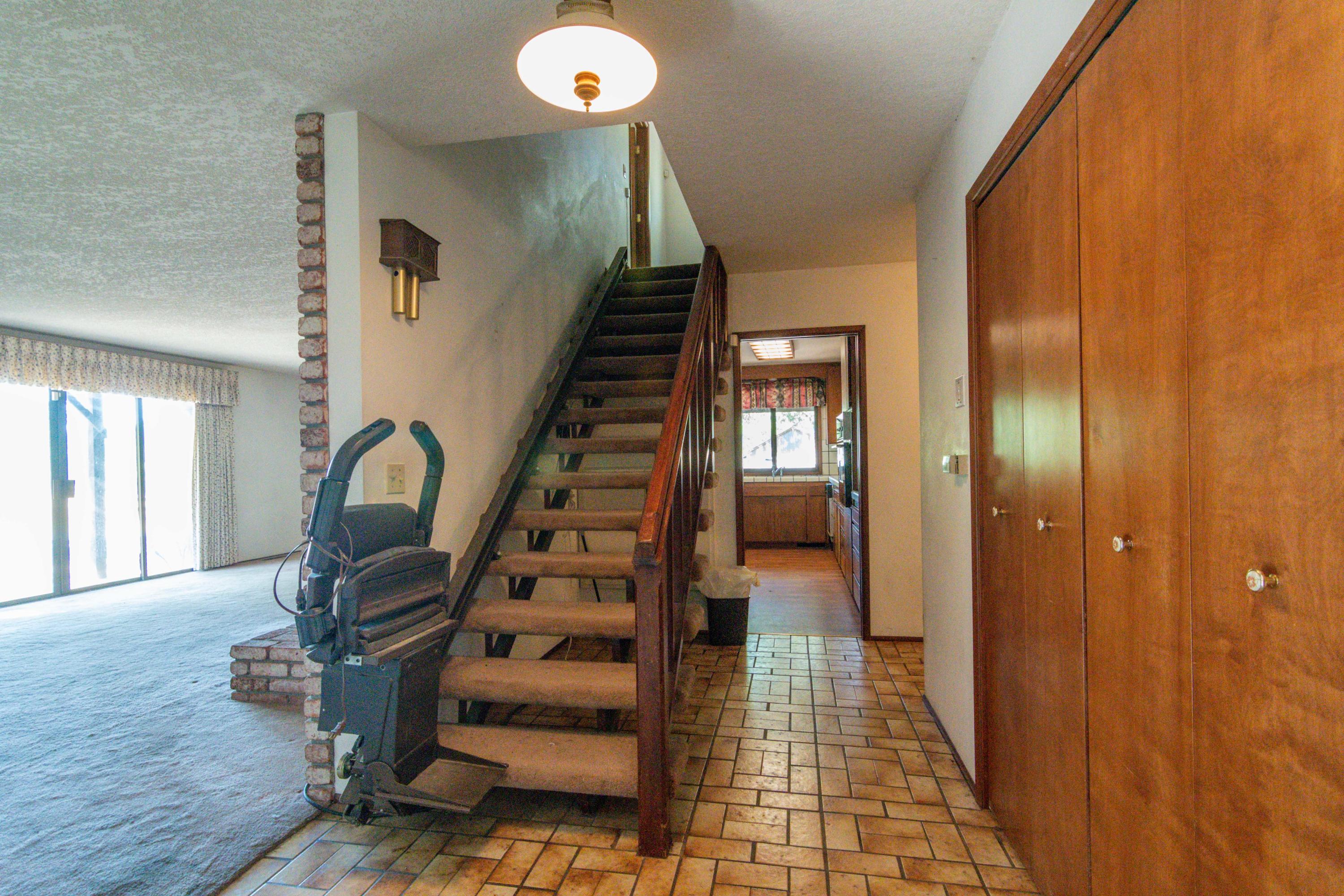 3580-3588 Hugo Road Merlin, OR 97532 - Photo 15 of 37 Stair case with chair lift