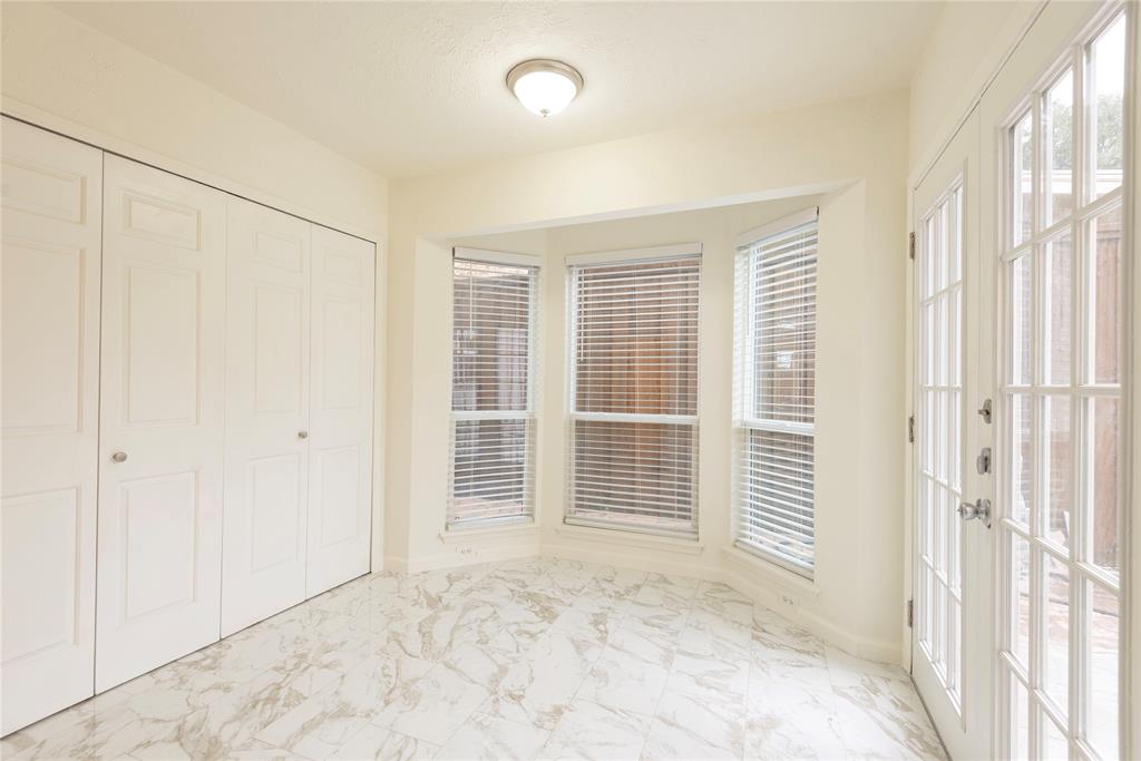 4080 Windhaven Lane Dallas, TX 75287 - Photo 14 of 24 an empty room with windows