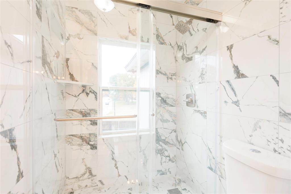 4080 Windhaven Lane Dallas, TX 75287 - Photo 20 of 24 a bathroom with a shower