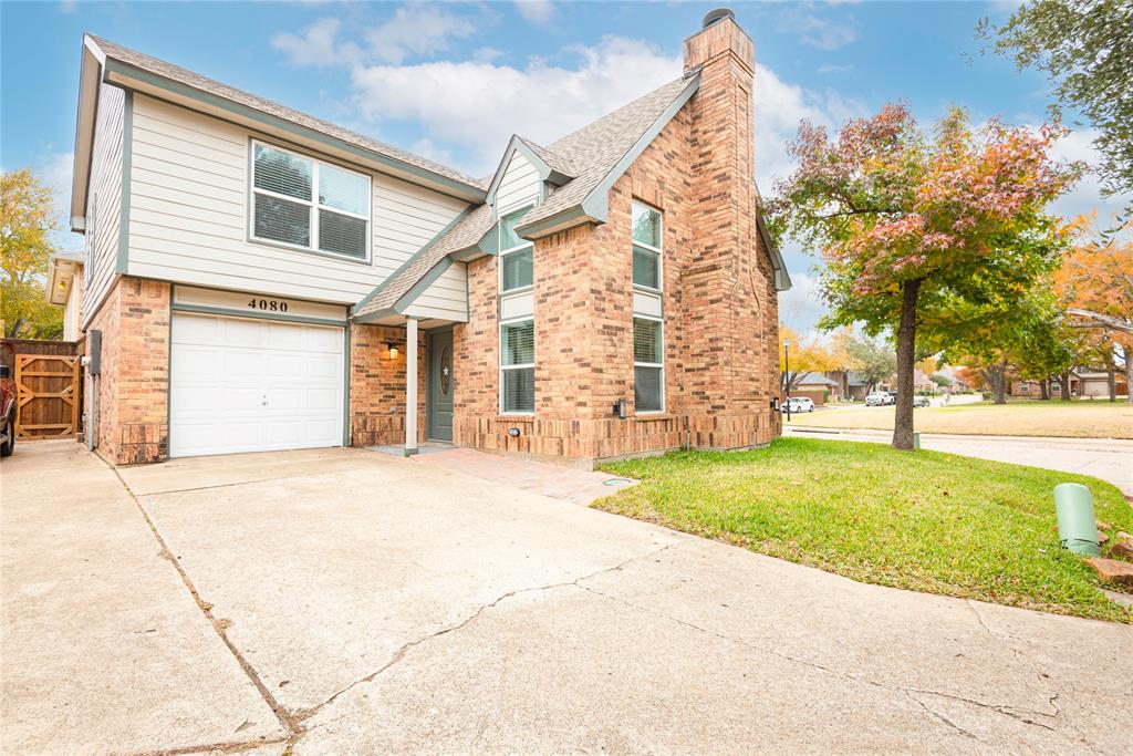 4080 Windhaven Lane Dallas, TX 75287 - Photo 4 of 24 a front view of house with yard