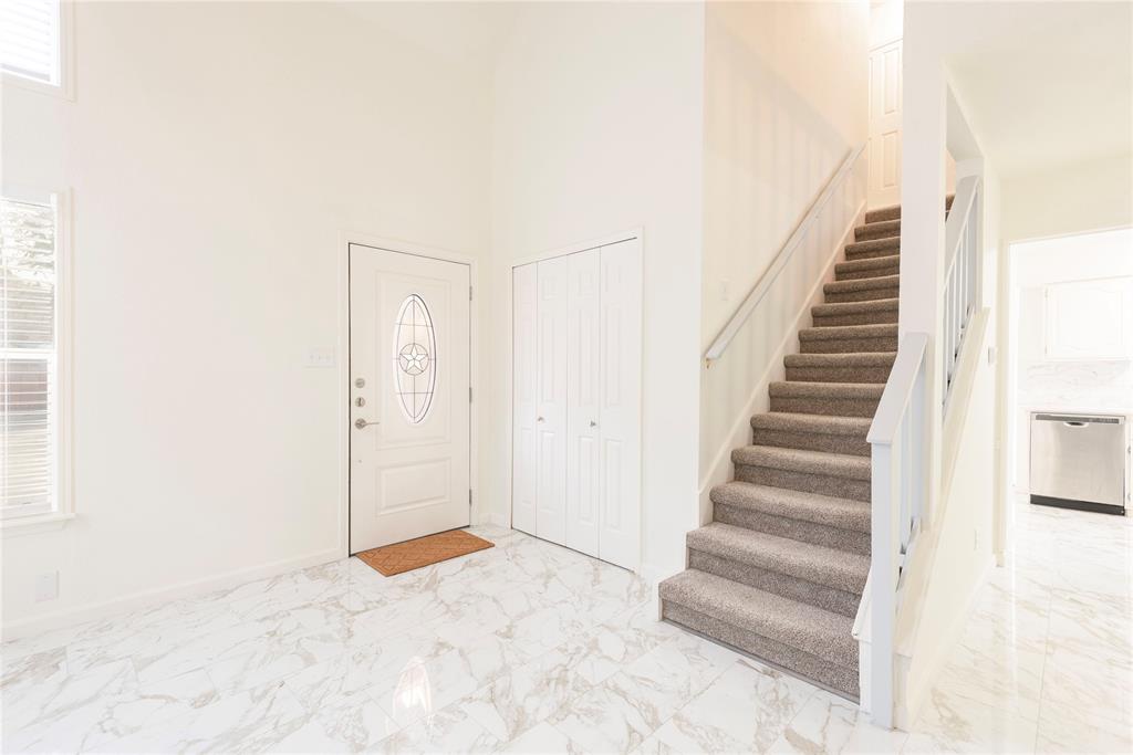 4080 Windhaven Lane Dallas, TX 75287 - Photo 6 of 24 a view of staircase with white walls and white walls
