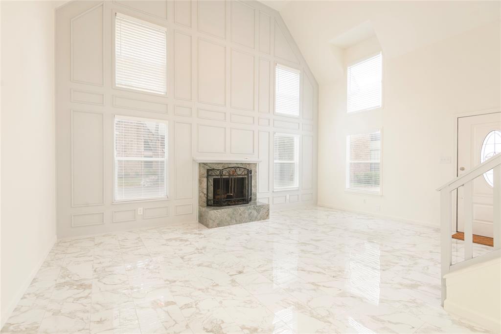 4080 Windhaven Lane Dallas, TX 75287 - Photo 7 of 24 a view of empty room with a fireplace