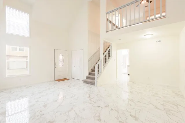 a view of an entryway with staircase