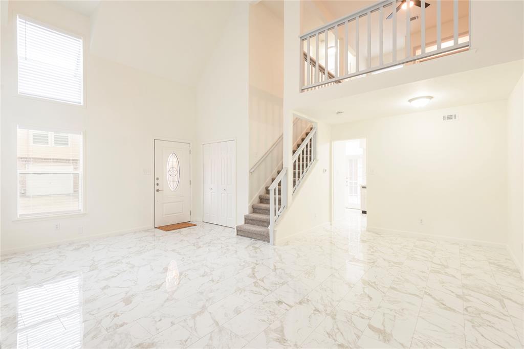4080 Windhaven Lane Dallas, TX 75287 - Photo 8 of 24 a view of an entryway with staircase