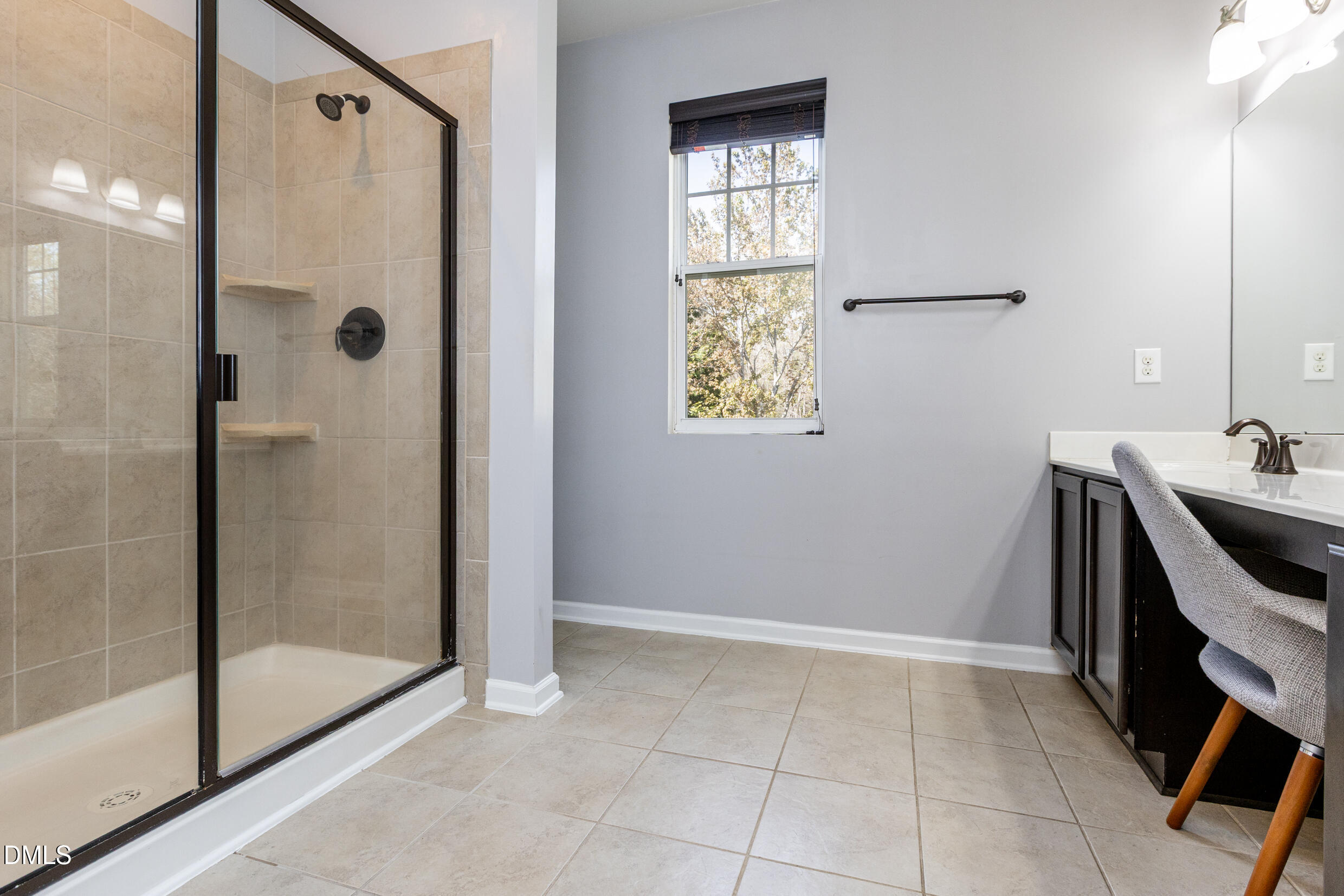 7250 Terregles Drive Raleigh, NC 27617 - Photo 11 of 19 a bathroom with a bathtub and shower