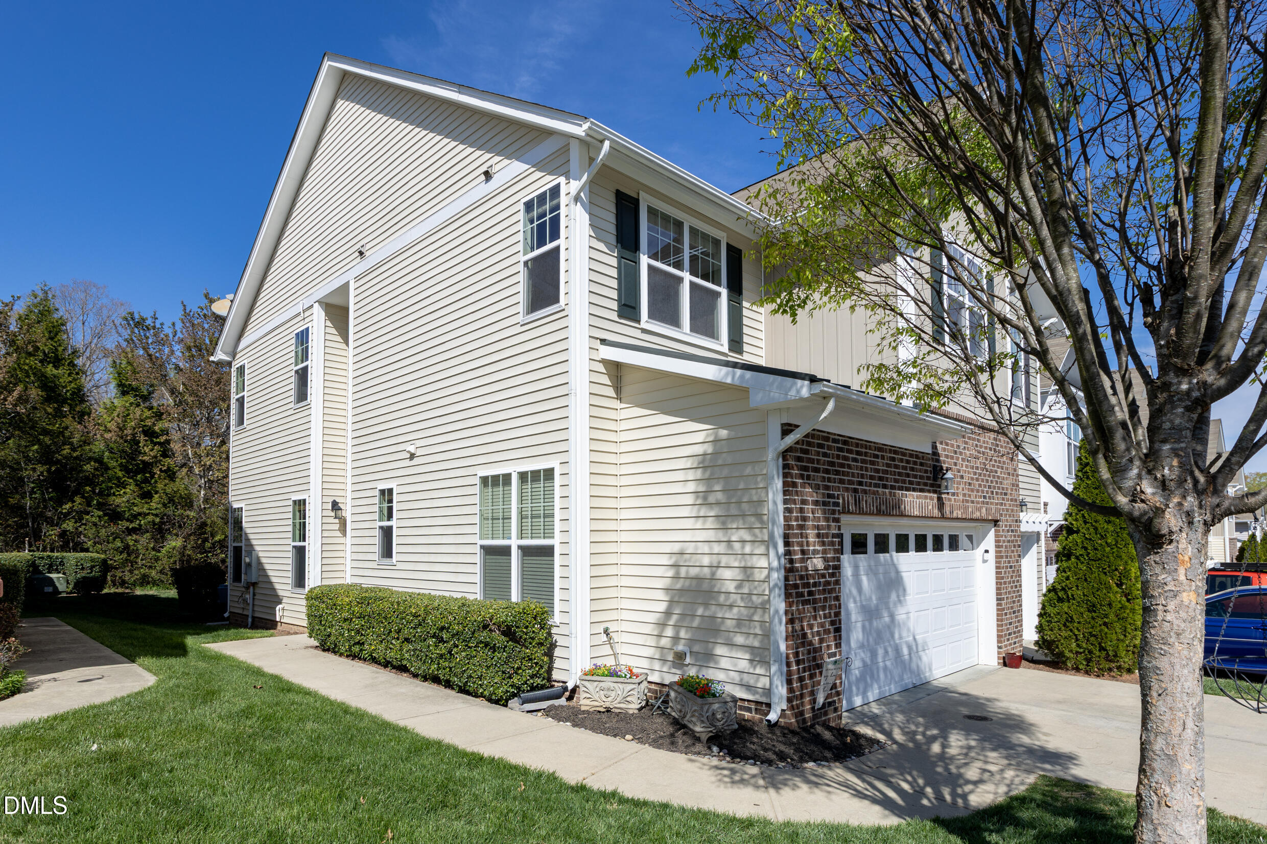 7250 Terregles Drive Raleigh, NC 27617 - Photo 2 of 19 a front view of a house with a yard