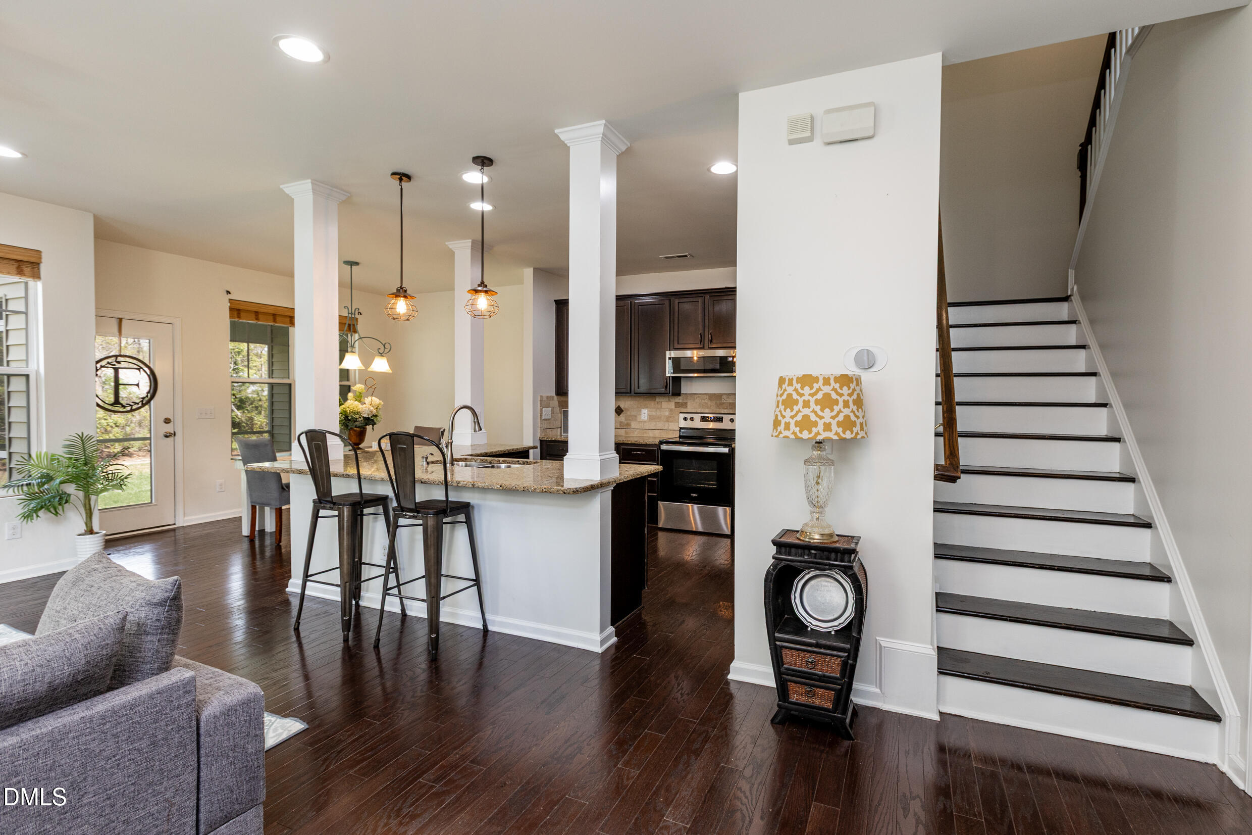 7250 Terregles Drive Raleigh, NC 27617 - Photo 3 of 19 a living room with furniture and wooden floor