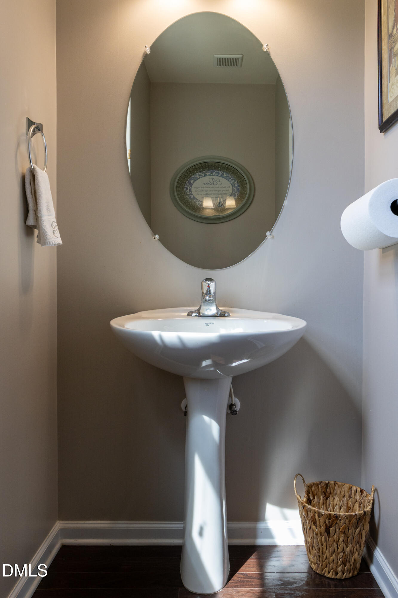 7250 Terregles Drive Raleigh, NC 27617 - Photo 9 of 19 a bathroom with a sink and mirror