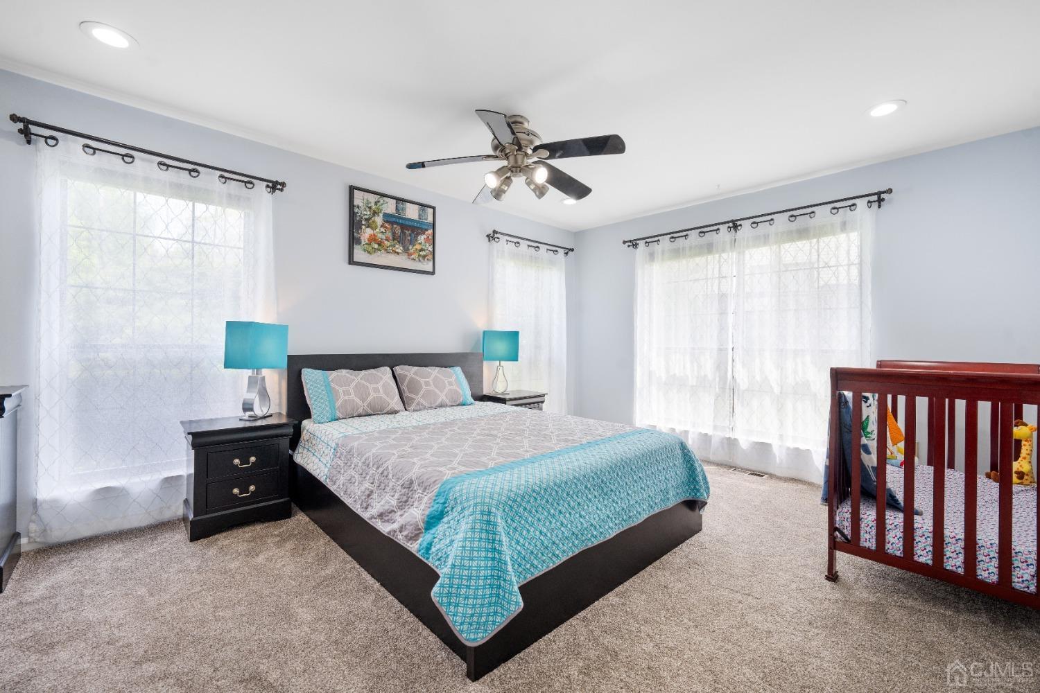 1501 Timber Oaks Road Edison, NJ 08820 - Photo 8 of 17 a bedroom with a bed and window