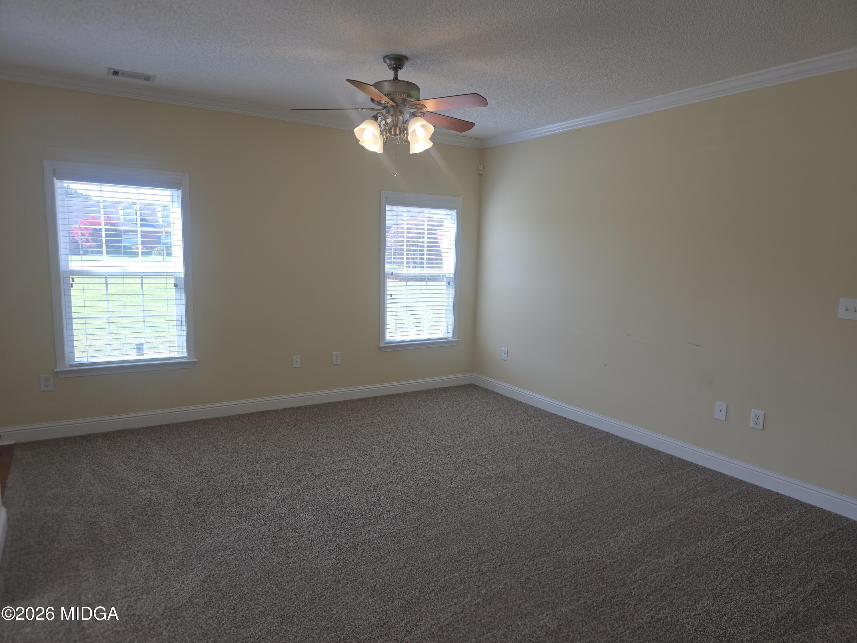 143 Jabrok Circle Macon, GA 31216 - Photo 6 of 15 wooden floor in an empty room with a window