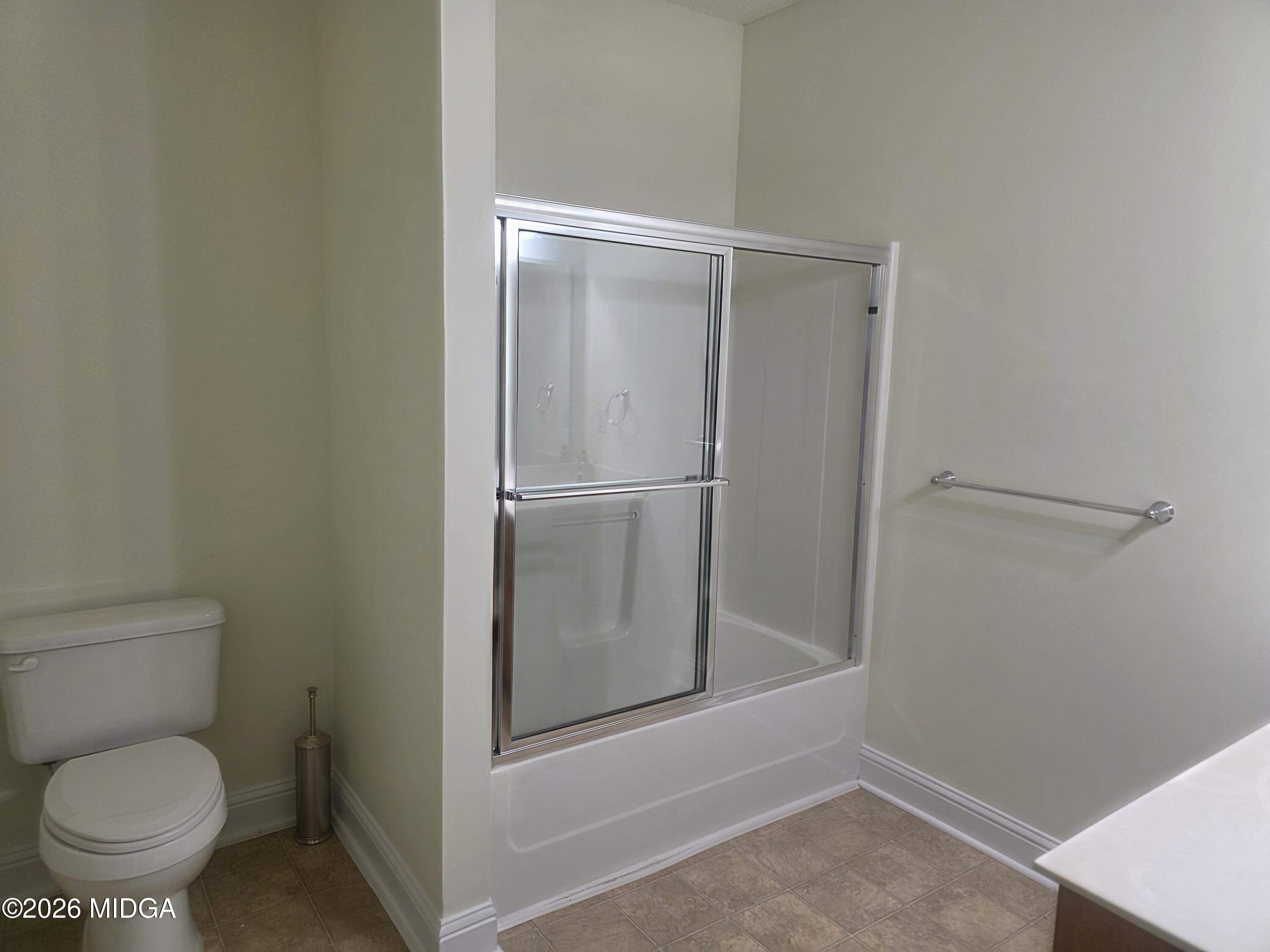 143 Jabrok Circle Macon, GA 31216 - Photo 10 of 15 a bathroom with a toilet and a shower