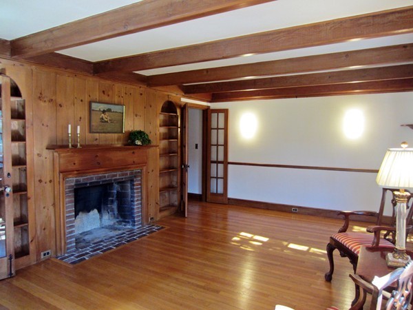 61 Denton Road Wellesley, MA 02482 - Photo 5 of 16 a view of an empty room with wooden floor fire place