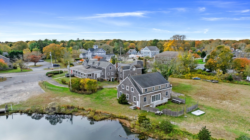 an aerial view of a house with a garden