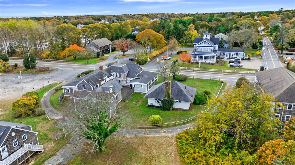 126 Route 28 Harwich, MA 02671 - Photo 6 of 35 a view of a swimming pool with a patio
