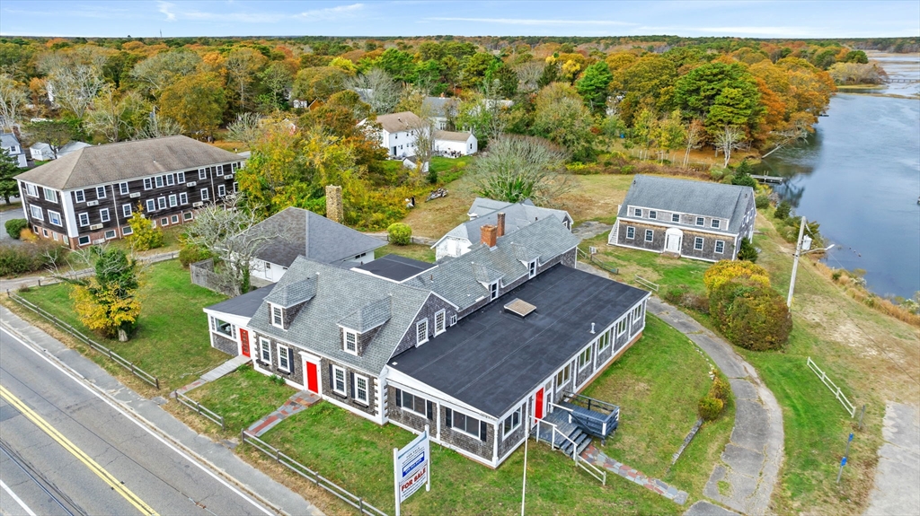 126 Route 28 Harwich, MA 02671 - Photo 10 of 35 an aerial view of a house with a swimming pool
