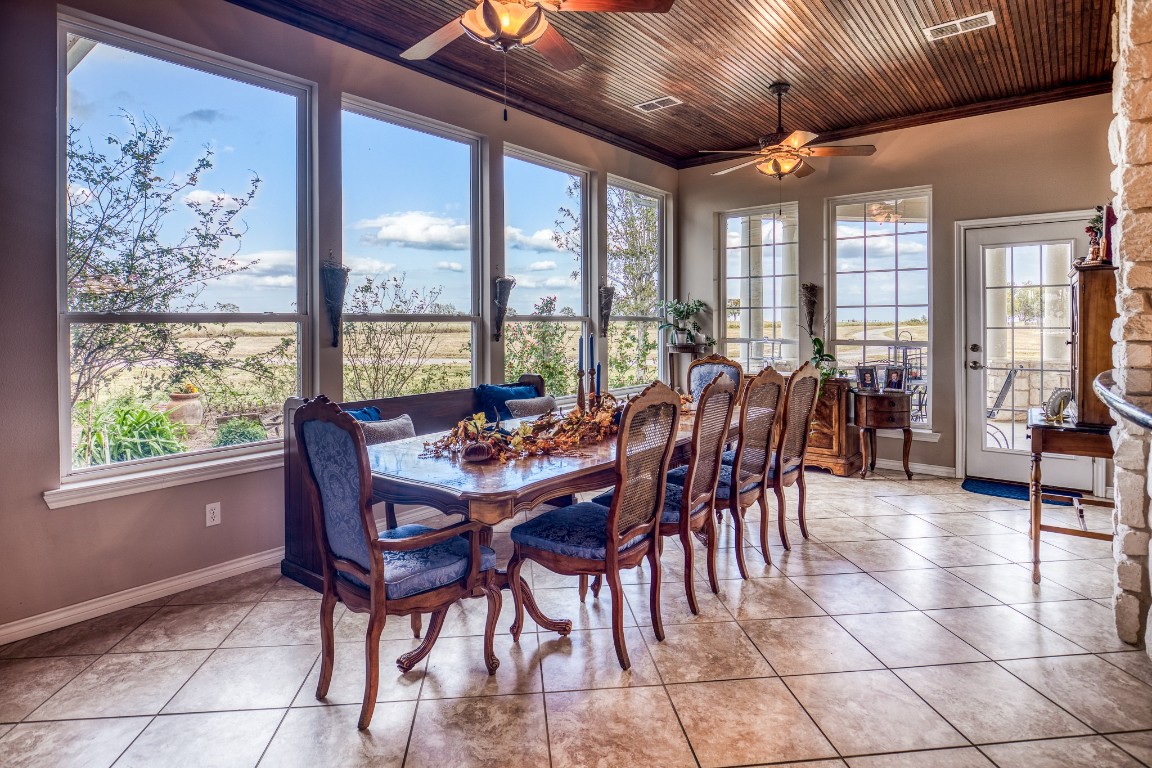 4701 Cedar Hill Road Brenham, TX 77833 - Photo 18 of 50 a view of a dining room with furniture window and outside view