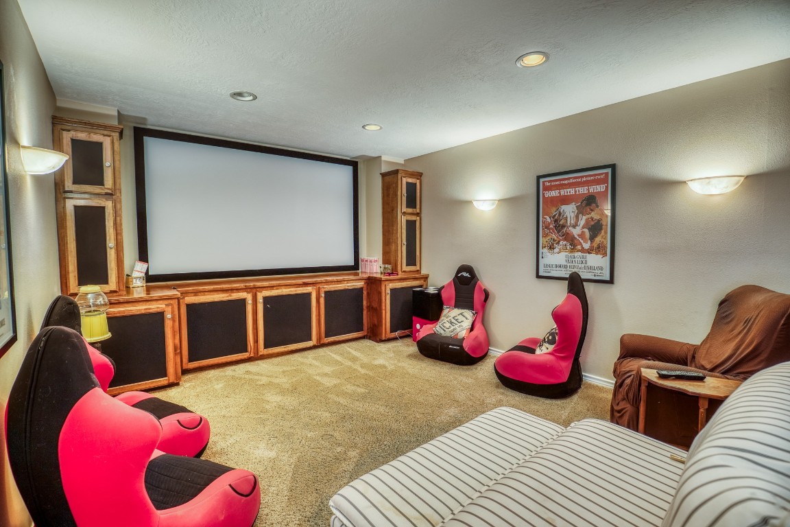 4701 Cedar Hill Road Brenham, TX 77833 - Photo 23 of 50 a living room with furniture and a flat screen tv
