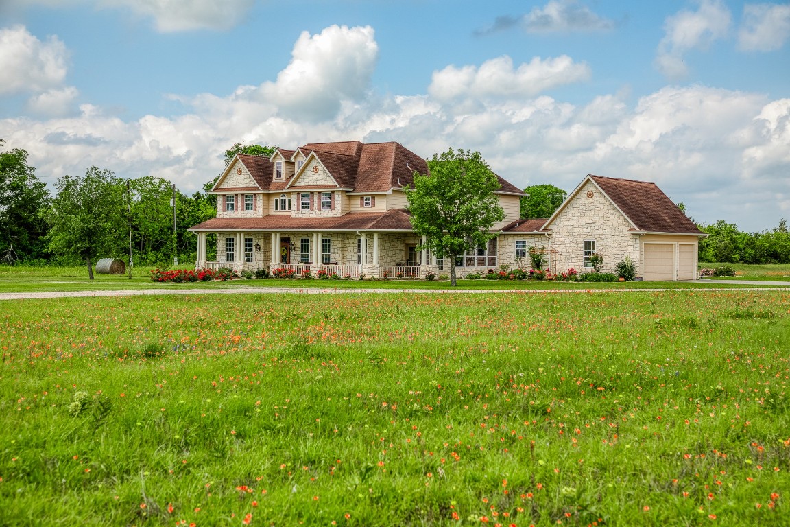 4701 Cedar Hill Road Brenham, TX 77833 - Photo 29 of 50 a view of a house with a big yard