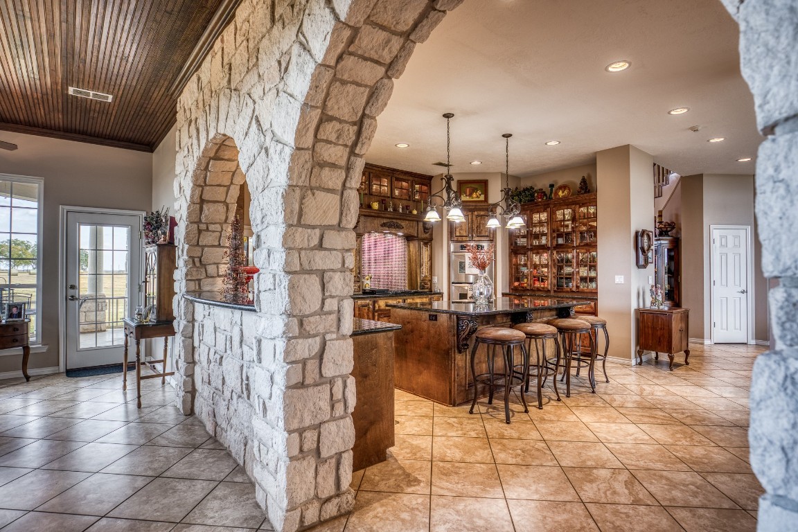 4701 Cedar Hill Road Brenham, TX 77833 - Photo 7 of 50 a view of a lobby with furniture and chandelier