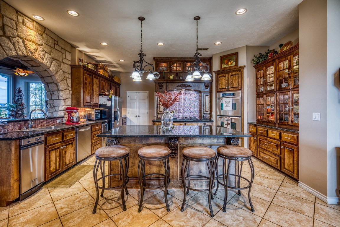 4701 Cedar Hill Road Brenham, TX 77833 - Photo 8 of 50 a view of a chairs and table in a patio
