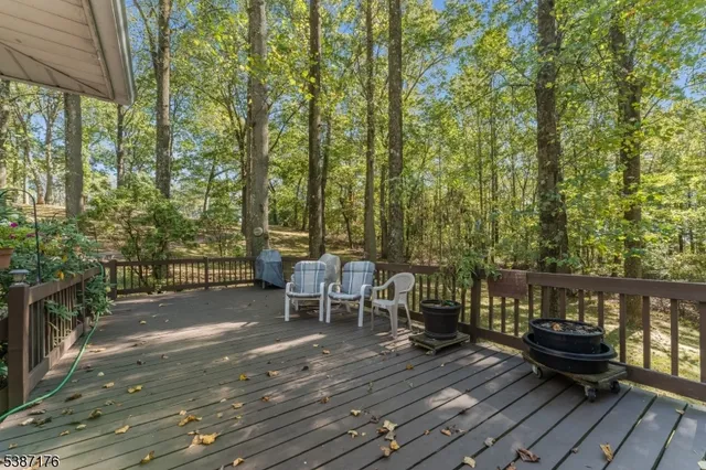a view of a patio with wooden floor