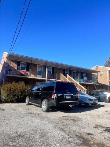a car parked in front of a house
