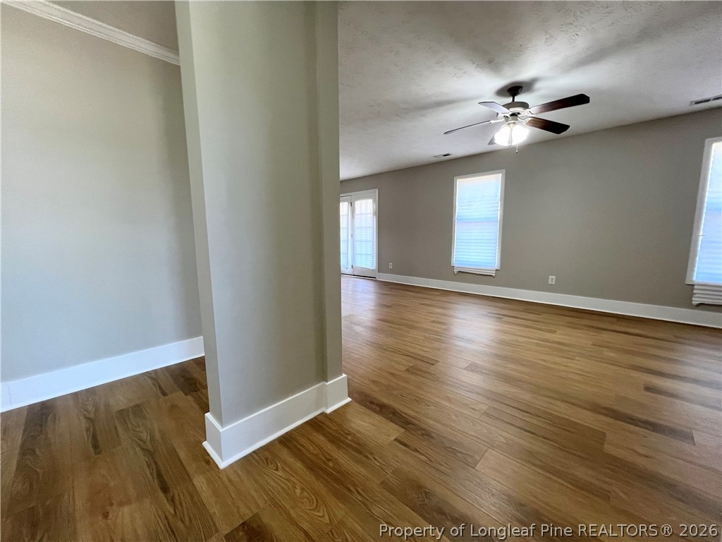 240 Declaration Drive Raeford, NC 28376 - Photo 12 of 37 a view of an empty room with wooden floor