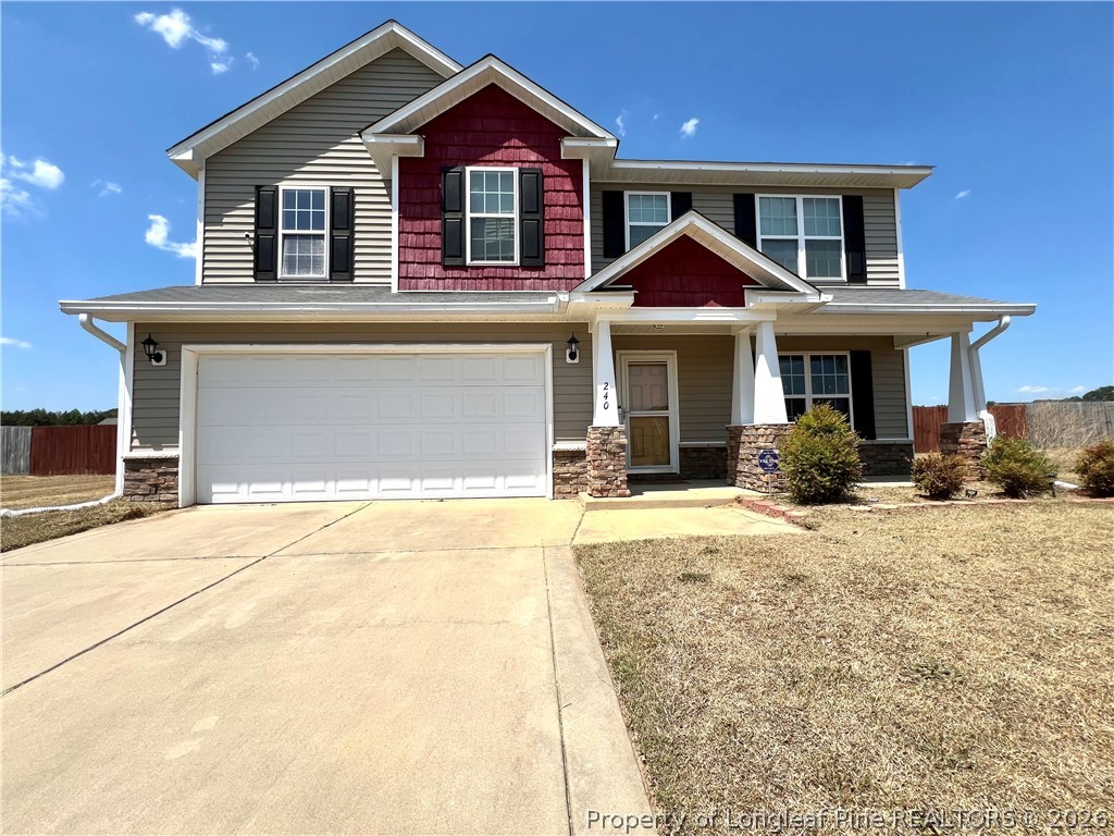 240 Declaration Drive Raeford, NC 28376 - Photo 2 of 37 a front view of a house with yard