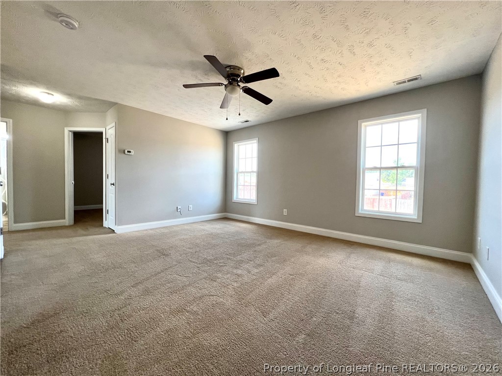 240 Declaration Drive Raeford, NC 28376 - Photo 23 of 37 a view of a livingroom with a ceiling fan and window