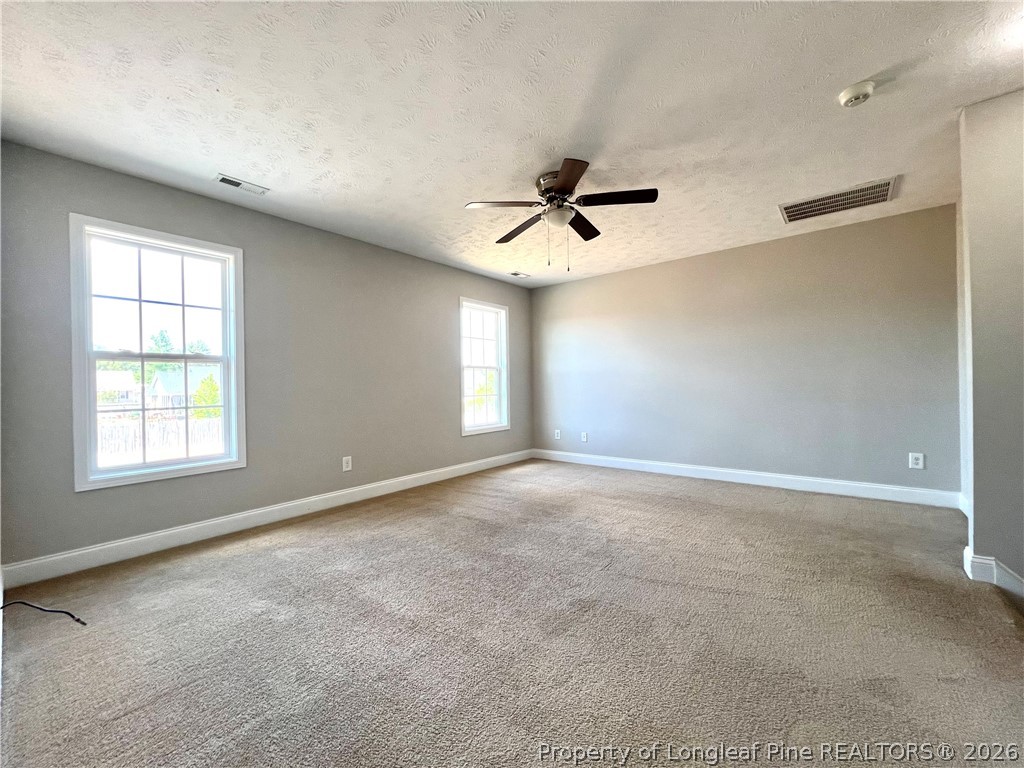 240 Declaration Drive Raeford, NC 28376 - Photo 28 of 37 a view of an empty room with a window