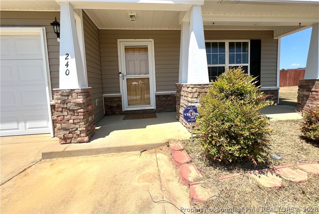 240 Declaration Drive Raeford, NC 28376 - Photo 3 of 37 a view of a entryway door front of house