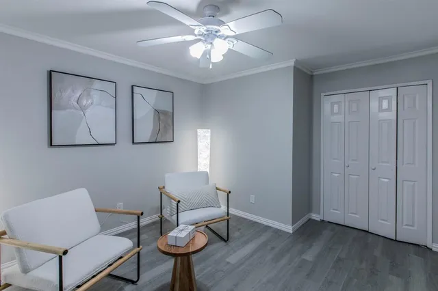 a bathroom with a granite countertop sink toilet a mirror a bathtub and shower