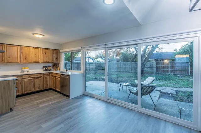 a kitchen with a window a sink and counter space