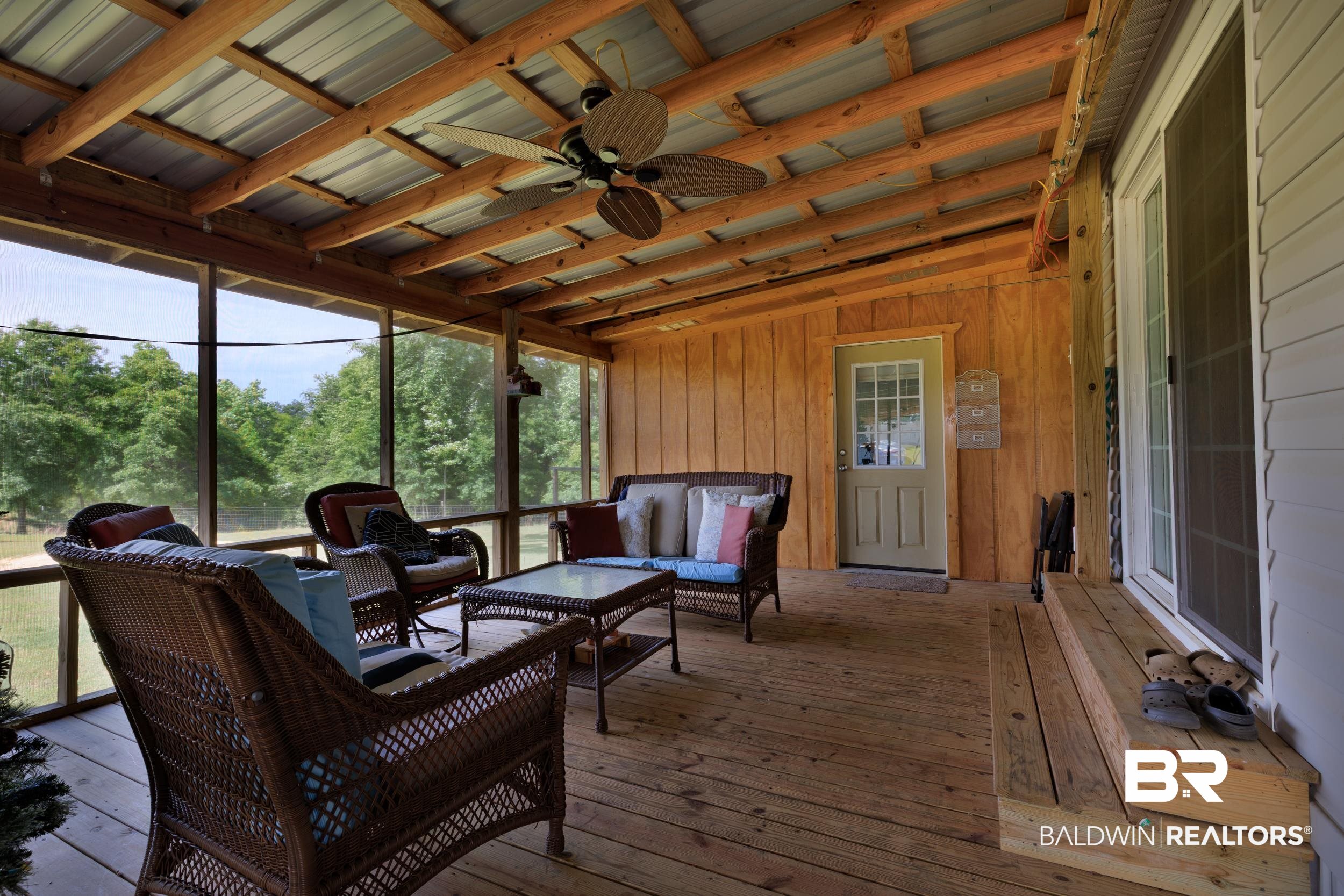 6725 Upper Creek Road Flomaton, AL 36441 - Photo 19 of 61 Sunroom / solarium with an outdoor hangout area, ceiling fan, and healthy amount of natural light