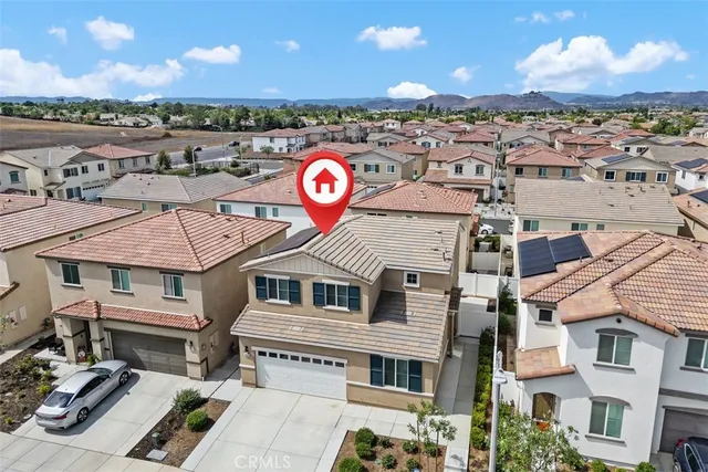 a view of a house with a ocean view