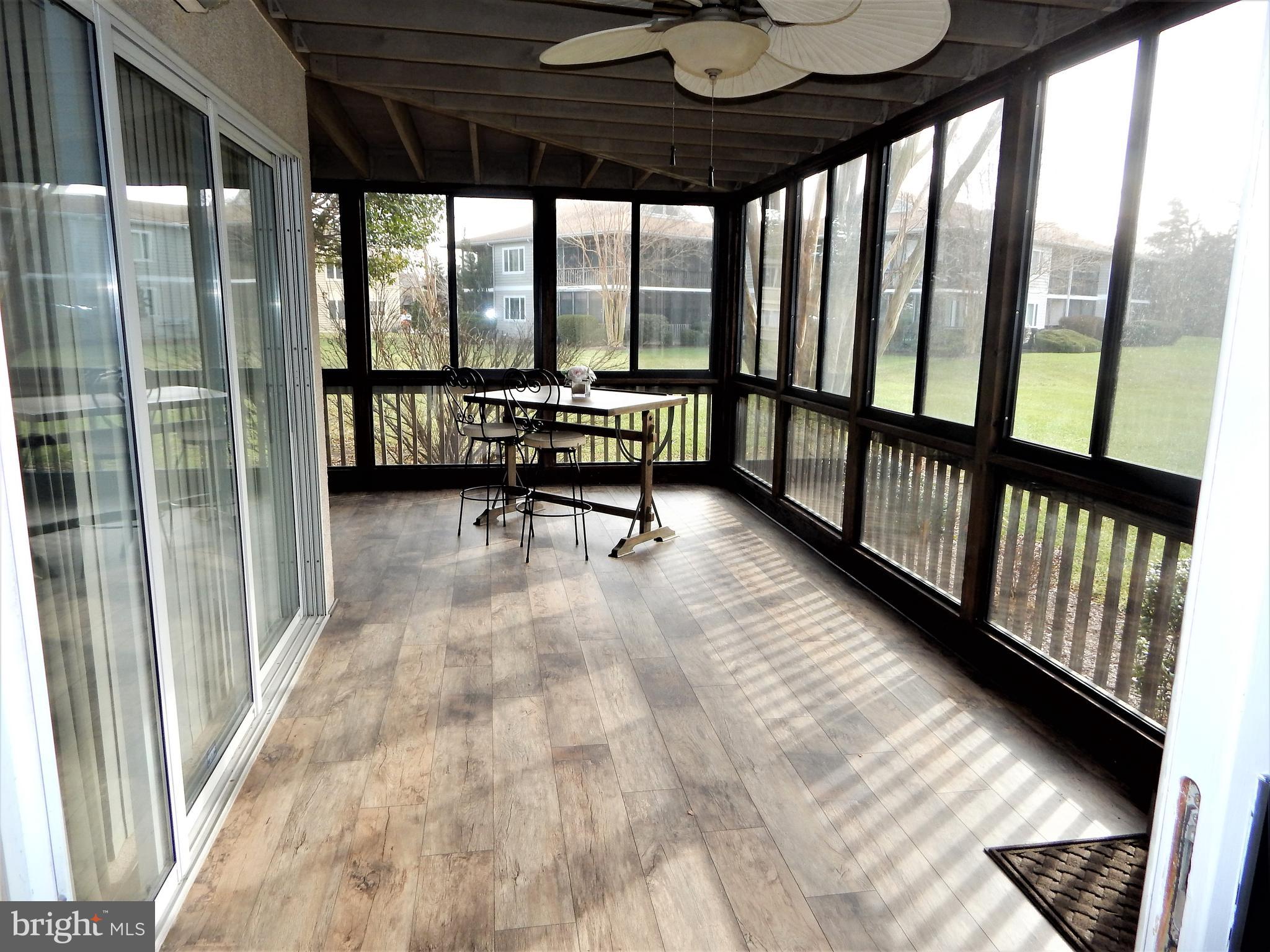18530 Drayton Hall Road, Unit 8 Lewes, DE 19958 - Photo 16 of 16 Dining Room View & Access to Sunroom
