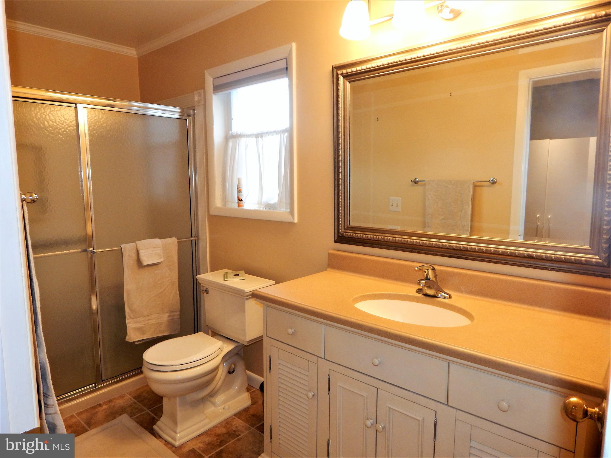 18530 Drayton Hall Road, Unit 8 Lewes, DE 19958 - Photo 9 of 16 Master Bathroom w/ ceramic tile &updated bathroom