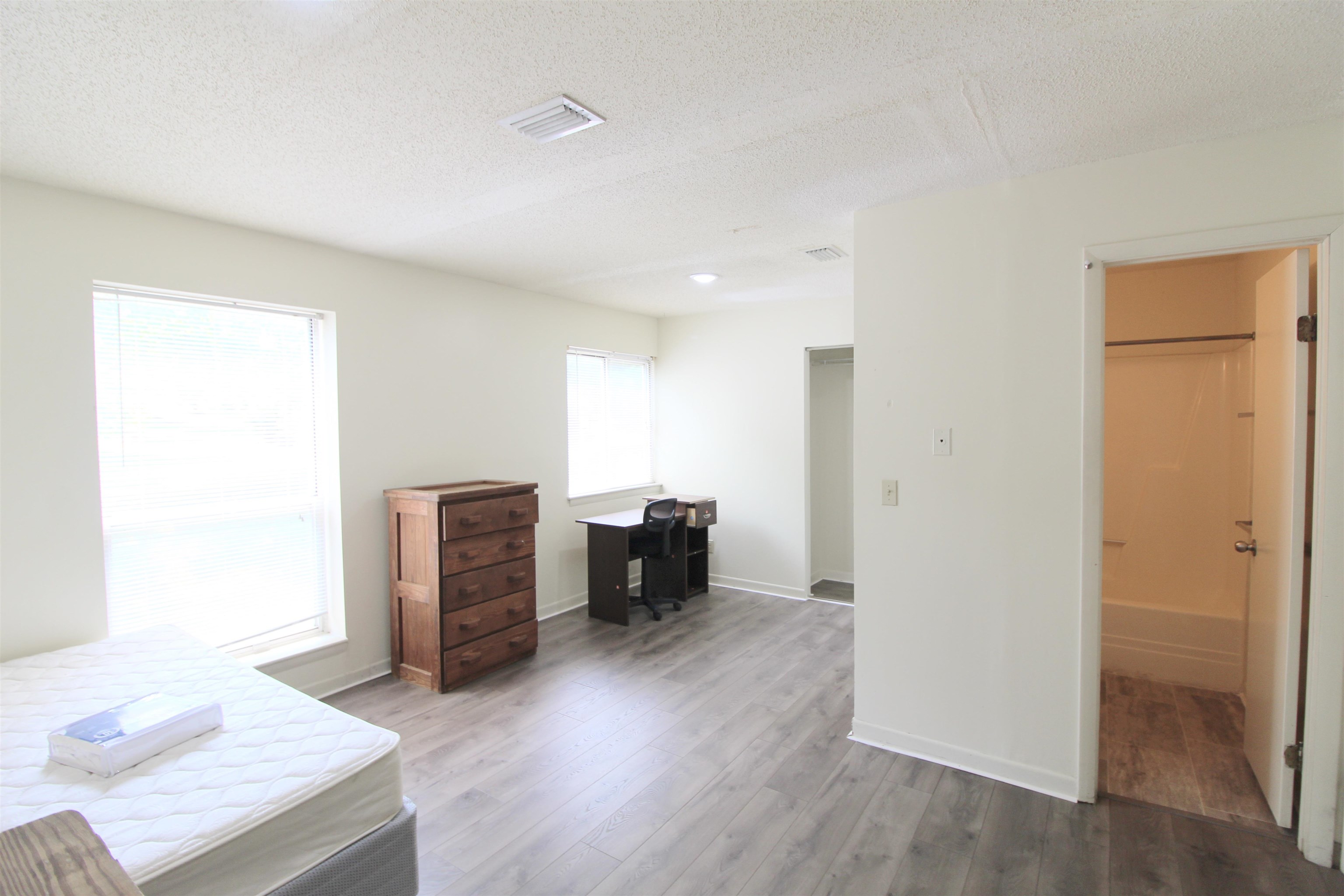 1336 Hunters Road, Unit G Harrisonburg, VA 22801 - Photo 17 of 42 a view of a livingroom with furniture and wooden floor