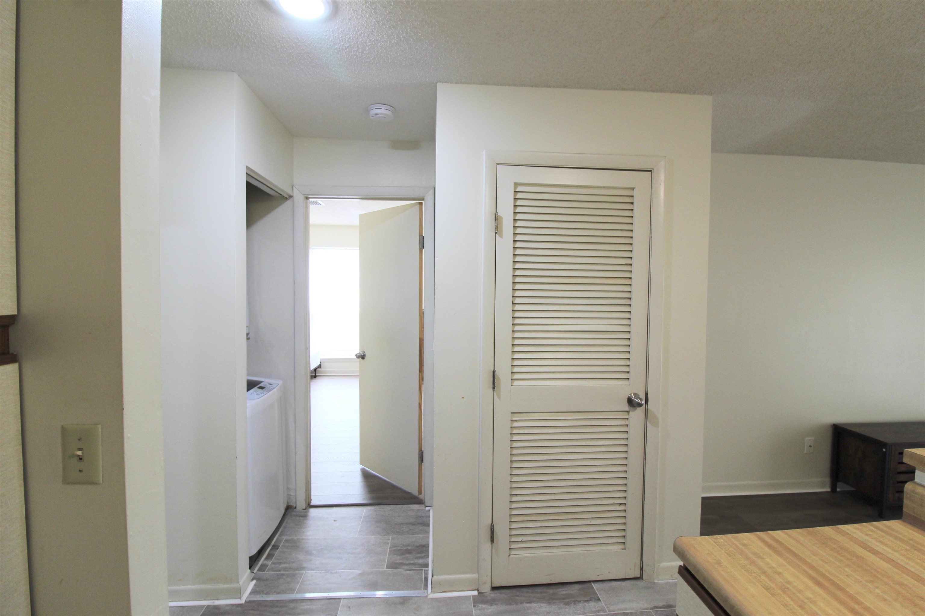 1336 Hunters Road, Unit G Harrisonburg, VA 22801 - Photo 21 of 42 a view of room with walk in closet and wooden floor