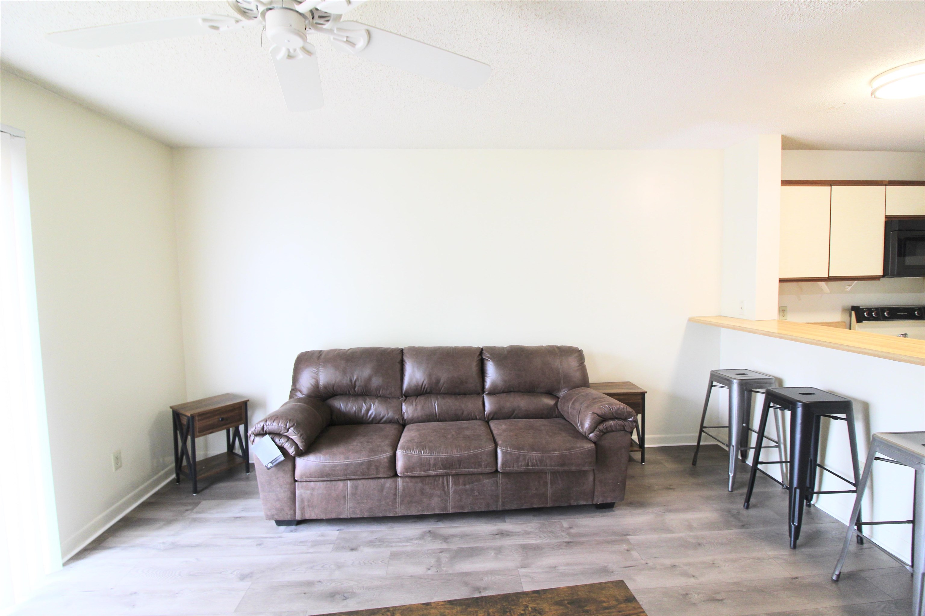 1336 Hunters Road, Unit G Harrisonburg, VA 22801 - Photo 27 of 42 a living room with furniture and a couch