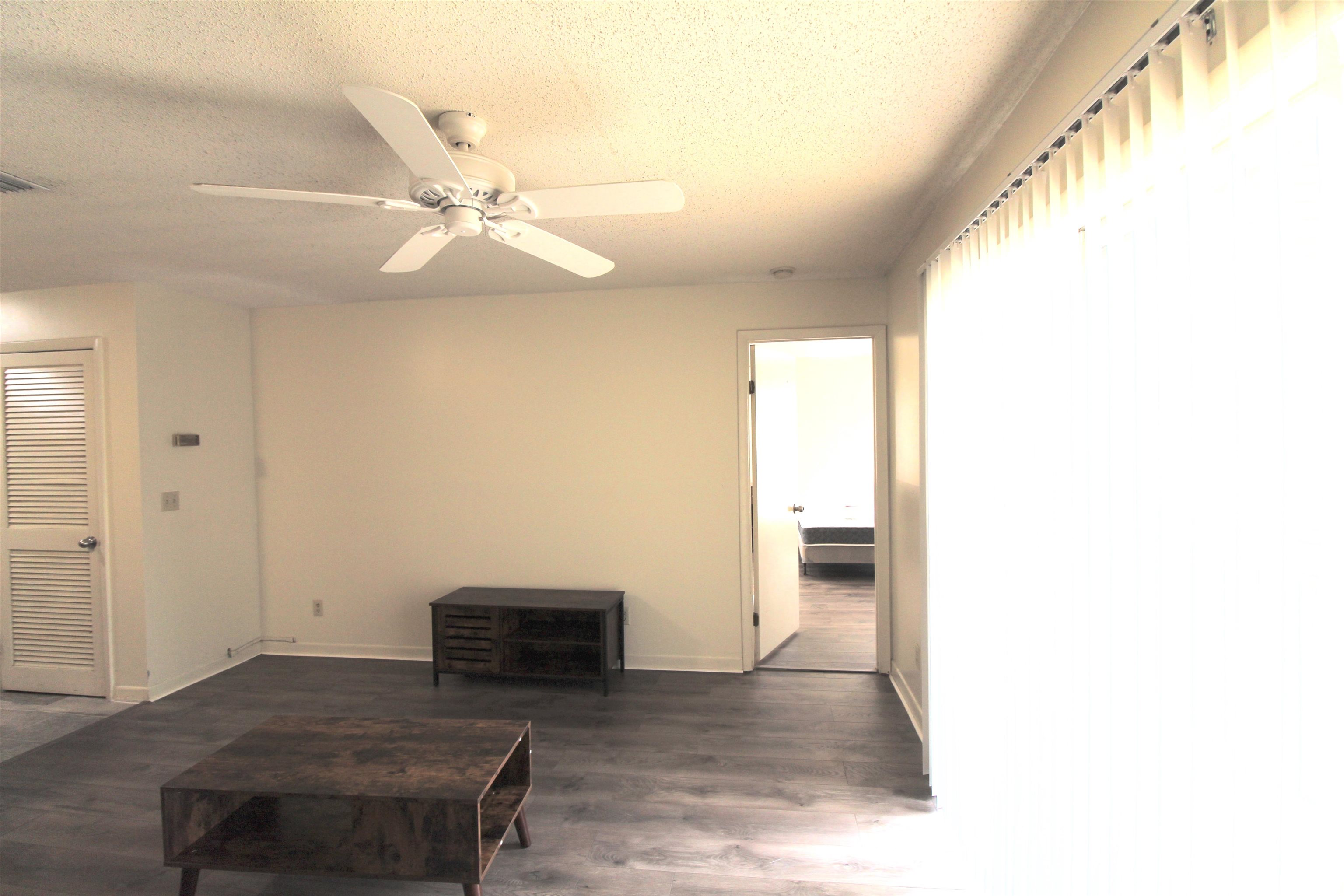 1336 Hunters Road, Unit G Harrisonburg, VA 22801 - Photo 31 of 42 a view of livingroom with hardwood floor and ceiling fan