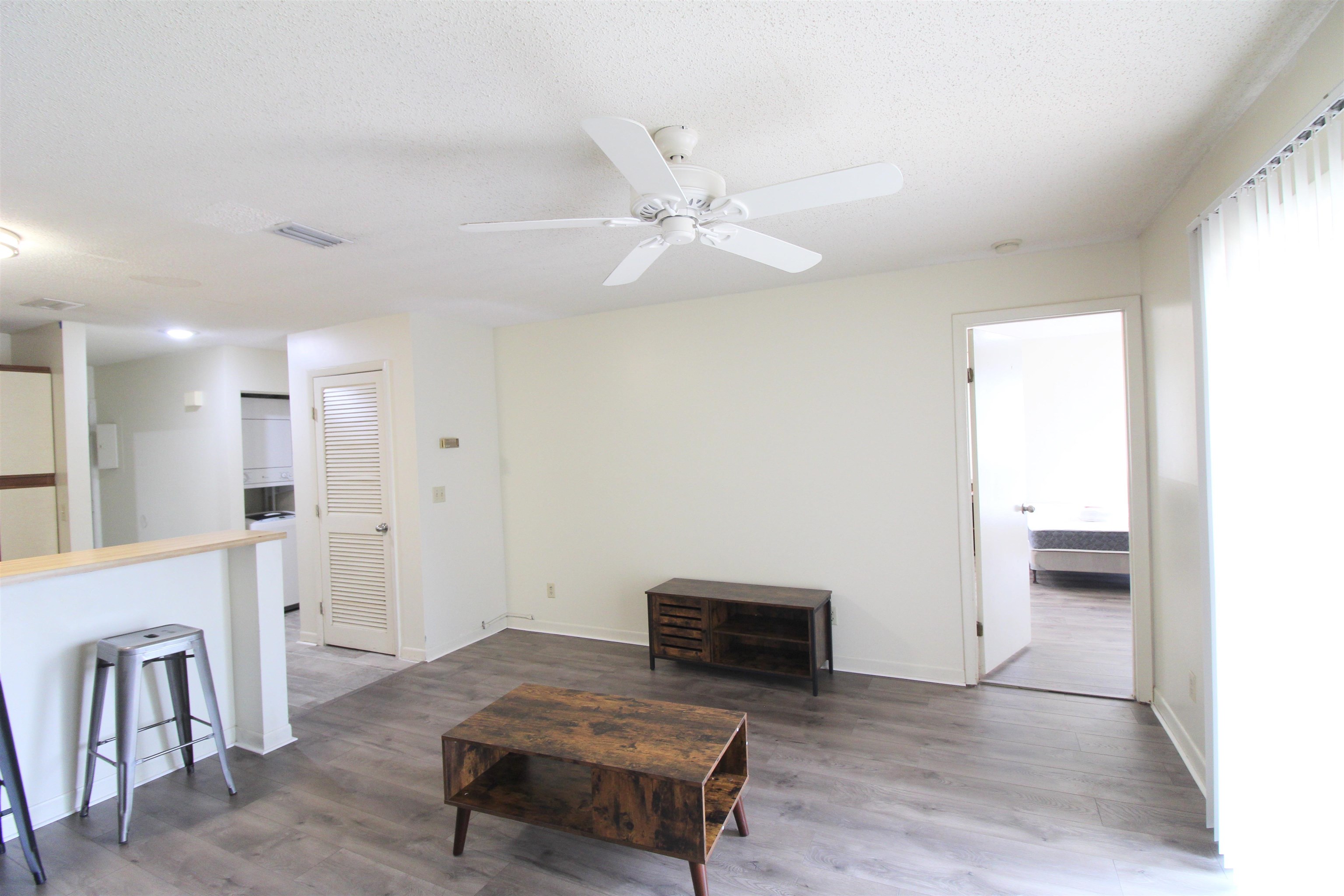1336 Hunters Road, Unit G Harrisonburg, VA 22801 - Photo 32 of 42 a living room with furniture and a fireplace